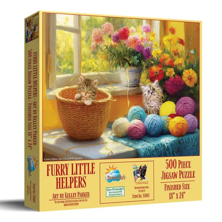 Jigsaw puzzle box featuring two cats and colorful yarn balls with a window and flowers in the background.