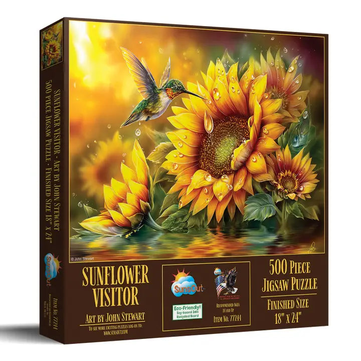 Jigsaw puzzle box featuring sunflowers and a hummingbird with 'Sunflower Visitor' artwork by John Stewart.