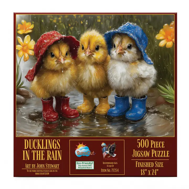 Jigsaw puzzle box featuring three ducklings in raincoats and boots with flowers in the background.