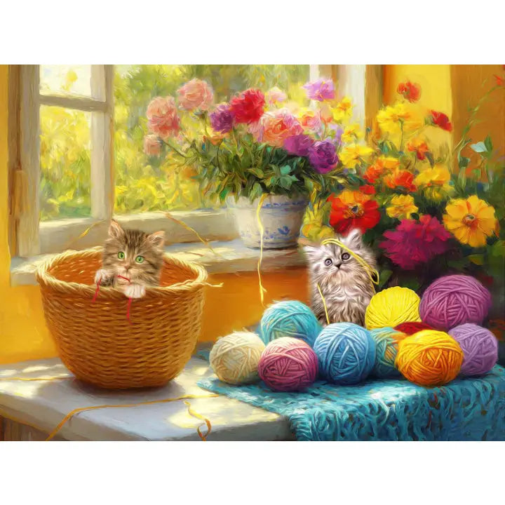 Two kittens playing with colorful yarn balls on a windowsill with flowers in the background.